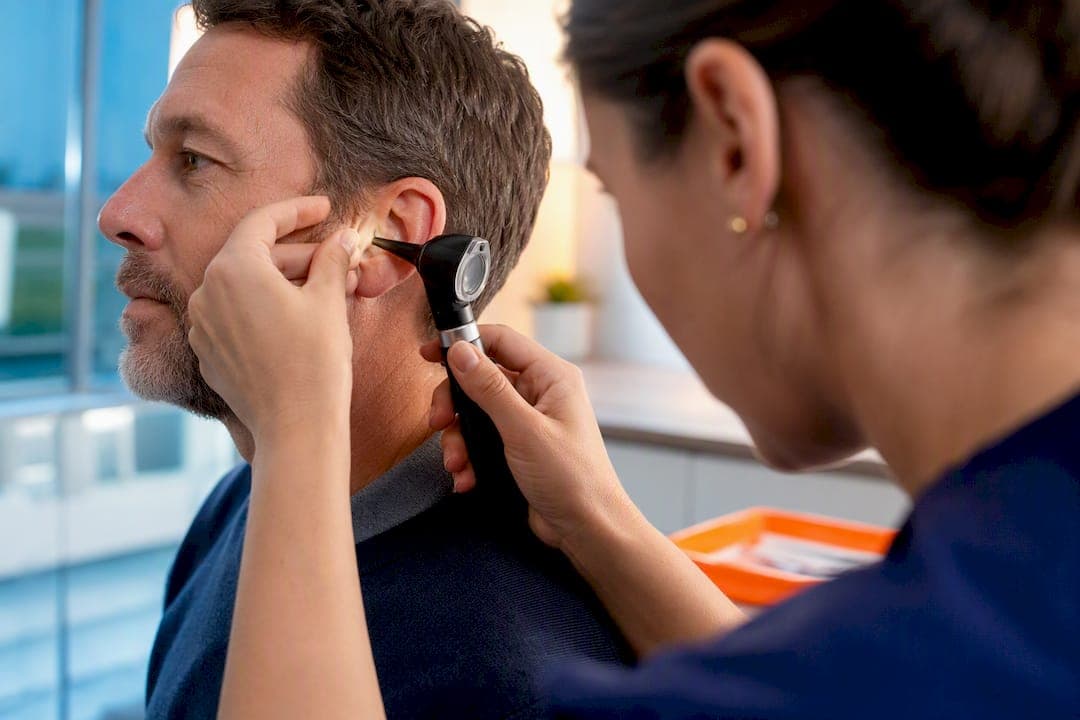 UK ear wax removal: Soften for 3–7 days, then safe clinic options